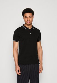 Lindbergh CONTRAST PIPING - Bluză polo - black