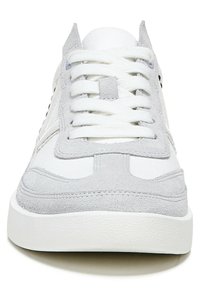 White and grey athletic shoes with a suede and fabric upper, flat laces, a padded tongue, and a textured rubber sole.