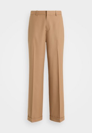 Beige maßgeschneiderte Hose mit geradem Bein, aus weichem Stoff, mit einer mittigen Bügelfalte und umgeschlagenen Säumen.