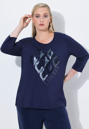 Navy blue long-sleeve t-shirt with a round neckline, featuring a shiny silver flame design and the word "LOVELY" in a metallic finish.