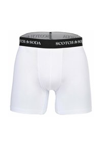 Weiße Boxershorts aus weichem Stoff, mit einem schwarzen elastischen Bund, auf dem "SCOTCH & SODA" in Weiß gedruckt ist.