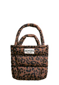 Brown quilted tote bag with black leopard print, featuring two padded handles and a front label that reads "SENSES .THE LABEL."