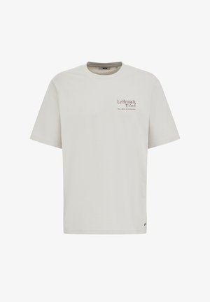 Svijetlosmeđa pamukasta majica kratkih rukava s okruglim dekolteom i logom na prsima u smeđoj boji. Ima ravni kroj i suptilnu teksturu.