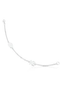 Bracciale in argento con un charm ovale e design di elefante, collegato da una delicata catena con chiusura a gancio. Finitura lucida.