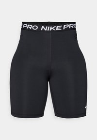 Pantaloncini Nike Pro neri con una fascia elastica larga che presenta la scritta bianca "NIKE PRO". Tessuto liscio con cuciture semplici e logo sull'orlo.