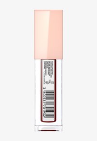 Conteneur à lèvres transparent avec un capuchon rose et brillant. L'étiquette contient des informations sur le produit et un code-barres sur un fond blanc.