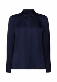 Blouse bleu marine à manches longues avec col pointu et patte de boutonnage dissimulée à l'avant, présentée sur un fond blanc uni.
