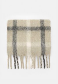 Rutelæder tørklæde i beige med grå og sorte accenter. Har frynse detaljer langs bundkanten. Blød, fuzzy tekstur.