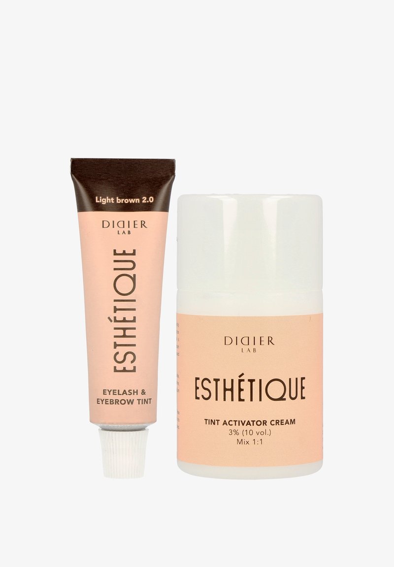 Tube de teinture pour cils et sourcils brun clair et flacon de crème activateur de teinture de Didier Lab Esthétique, présentés côte à côte sur fond blanc.