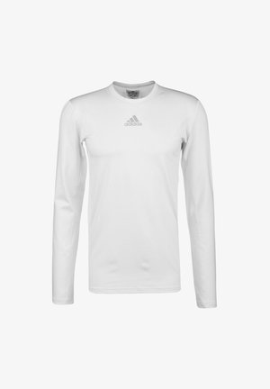 Witte longsleeve T-shirt van gladde stof met een ronde hals en een subtiele grijze Adidas-logo op de borst.