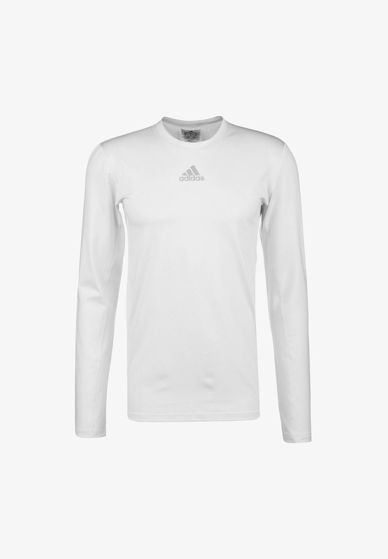 T-shirt bianco a maniche lunghe realizzato in tessuto morbido, con un collo rotondo e un discreto logo Adidas grigio sul petto.