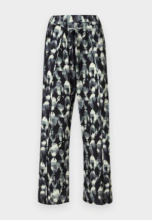 Platās bikses no kroku auduma ar maigu melnbaltu ziedu rakstu, ar elastīgu jostasvietu un aukliņu.