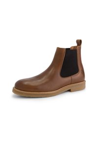 Bruine leren Chelsea-boot met elastische zijpanelen, ronde neus en een beige rubberen zool. Voorzien van een lus aan de achterkant voor gemakkelijk aan- en uittrekken.