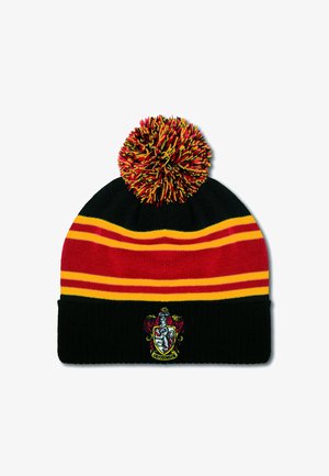 Knit beanie with black, red, and yellow horizontal stripes, featuring a large multicolored pom-pom and a Gryffindor crest on the front.