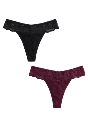 Deux culottes string en dentelle, une noire et une rouge foncé, présentant des motifs floraux et des ceintures taille festonnées.