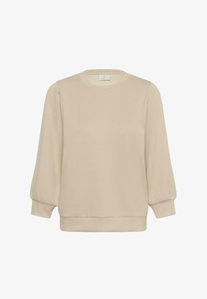 Beež pikkade varrukatega pluus põrkvarrukate ja kitsendatud mansettidega, ümmarguse kaelusega ja lõdva lõikega, valgel taustal.