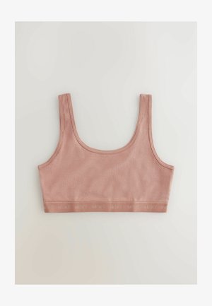 Rózsaszín pamut bralette sima textúrával, széles pántokkal és logóval díszített elasztikus pánttal az alján. Egyszerű, varrás nélküli kivitel.