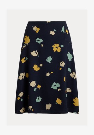 Jupe trapèze bleu marine avec des motifs floraux jaunes, beiges et verts clairs dispersés sur le tissu.