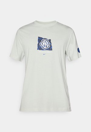 Jasnoszara koszulka z bawełny, ozdobiona niebiesko-czarnym graficznym wzorem z logo "Interazionale Milano" z przodu.