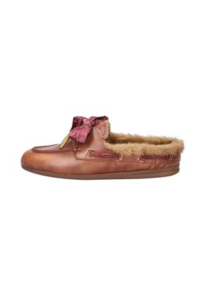 Brown leather moccasin slipper with tan fur lining and a red patterned fabric bow on top, flat sole, side view.