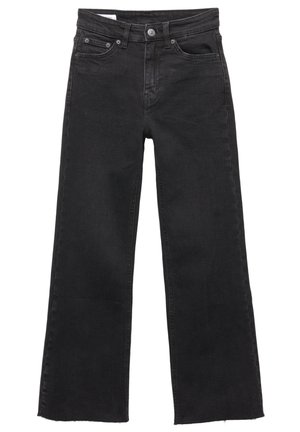 Svarta högmidjade vida jeans med knappstängning fram, bälten slingor och fem fickor, ligger platt på en vit bakgrund.