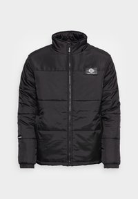 Black padded jacket with high collar, front zipper, and logo patch. Features elastic cuffs and horizontal stitching details for texture.
