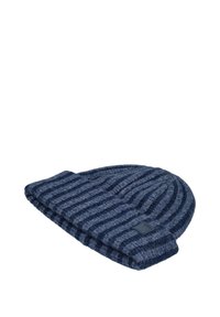 Folded blue and navy ribbed knit beanie with a small rectangular black label on the cuff against a white background.