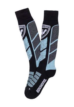 Ein Paar kniehohe Rossignol Sportsocken in Schwarz, Blau und Grau mit geometrischen Mustern sowie Logo im Waden- und Fußbereich.