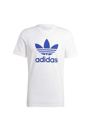 Valkoinen lyhythihainen t-paita, jossa sininen Adidas-trefoil-logo ja "adidas"-teksti keskellä edessä.