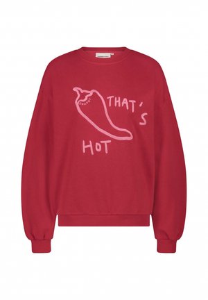 Red sweatshirt with long sleeves, ribbed cuffs, and a crew neck. Features a pink chili pepper graphic and the text "THAT'S HOT."