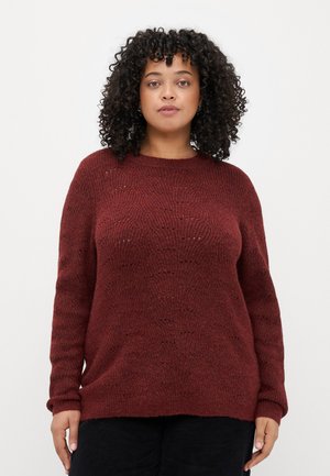 Sweater tricotado em bordeaux com um padrão texturizado, decote redondo e mangas longas. Material macio com um corte descontraído e punhos canelados.