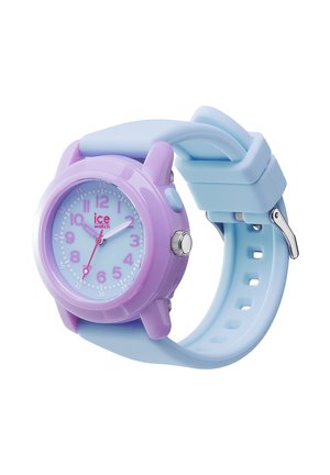 Orologio analogico per bambini con cassa rotonda viola, quadrante azzurro chiaro con numeri rosa e cinturino regolabile in silicone azzurro chiaro.
