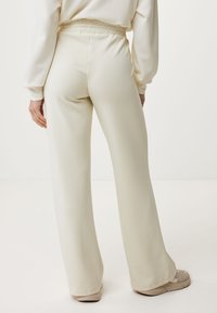 Pantaloni flare fit in velluto bambina
