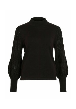 Črn pleteni pulover z visokim ovratnikom in teksturiranimi, napihnjenimi rokavi, ki imajo diamantni vzorec. Gladko telo z rebrastimi manšetami.