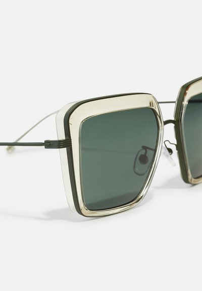 Tory Burch Aurinkolasit - transparent yellow