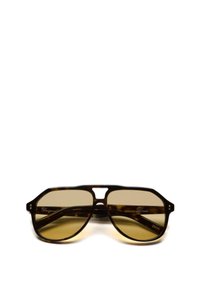 Sonnenbrille aus Schildpatt mit geometrischem Rahmen und getönten braunen Gläsern. Verfügt über eine leichte Augenbrauenleiste und Metallakzente an den Bügeln.
