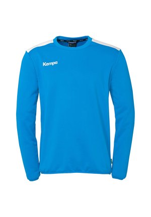 Mouwenlange sportshirt in felblauwe stof met witte schouderaccenten. Voorzien van een ronde halslijn en het 'Kempa'-logo in het wit.