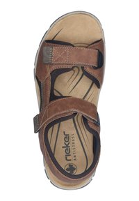 Brown leather sandal with two adjustable straps, cushioned footbed, and a textured, non-slip rubber sole. Features Rieker Antistress branding.