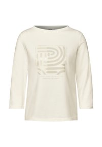 Krémové tričko s dlouhým rukávem, které obsahuje jemný grafický design s textem a labyrintovým vzorem ve světlejším odstínu, vyrobené z měkké bavlny.