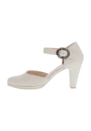 Elfenbeinfarbener High-Heel-Schuh mit gewellten Kanten und einem Knöchelriemen mit einer dekorativen silbernen Schnalle.