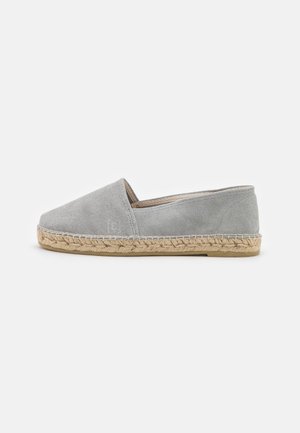 Gray suede espadrille with a rounded toe, woven jute sole, and a flat heel. Seam detailing along the sides and soft inner lining.