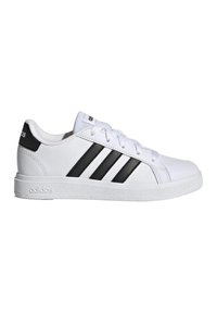 White athletic shoe made of synthetic material, featuring three black stripes, flat white laces, and a textured white rubber sole.