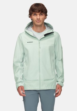 Veste imperméable vert menthe clair avec capuche, fermeture éclair à l'avant et logo. Présente deux poches latérales et un ourlet ajustable pour un ajustement parfait. Texture lisse.