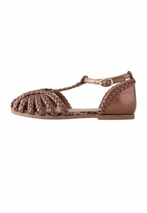 Child's metallic rose gold braided T-strap sandal with closed heel and flat sole.