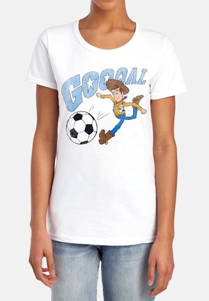 Person wearing white t-shirt with cartoon cowboy kicking a soccer ball and the word "GOOOAL" in large letters above.
