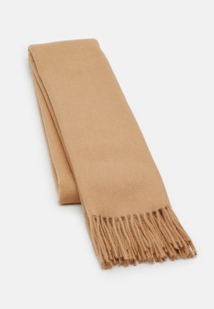 Écharpe en laine beige pliée, présentant une texture douce et des extrémités à franges, posée à plat sur un fond blanc.