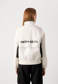 Calvin Klein Jeans RETRO TRACK JACKET - Training jacket - tofu