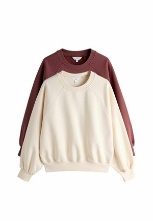 Deux sweat-shirts col rond, un beige devant et un rouge foncé derrière, tous deux avec manches longues et bords-côtes aux poignets et à l'ourlet.