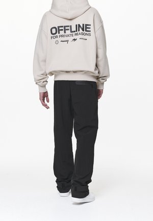 Sweater met rits - sand