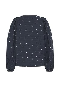 Blusa de color navy con mangas largas abullonadas, que presenta una tela texturizada y pequeños patrones de corazones blancos en toda la prenda. Puños elásticos en los extremos de las mangas.